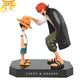 Shanks de Roodharige met Monkey D Luffy Figuur - One Piece™